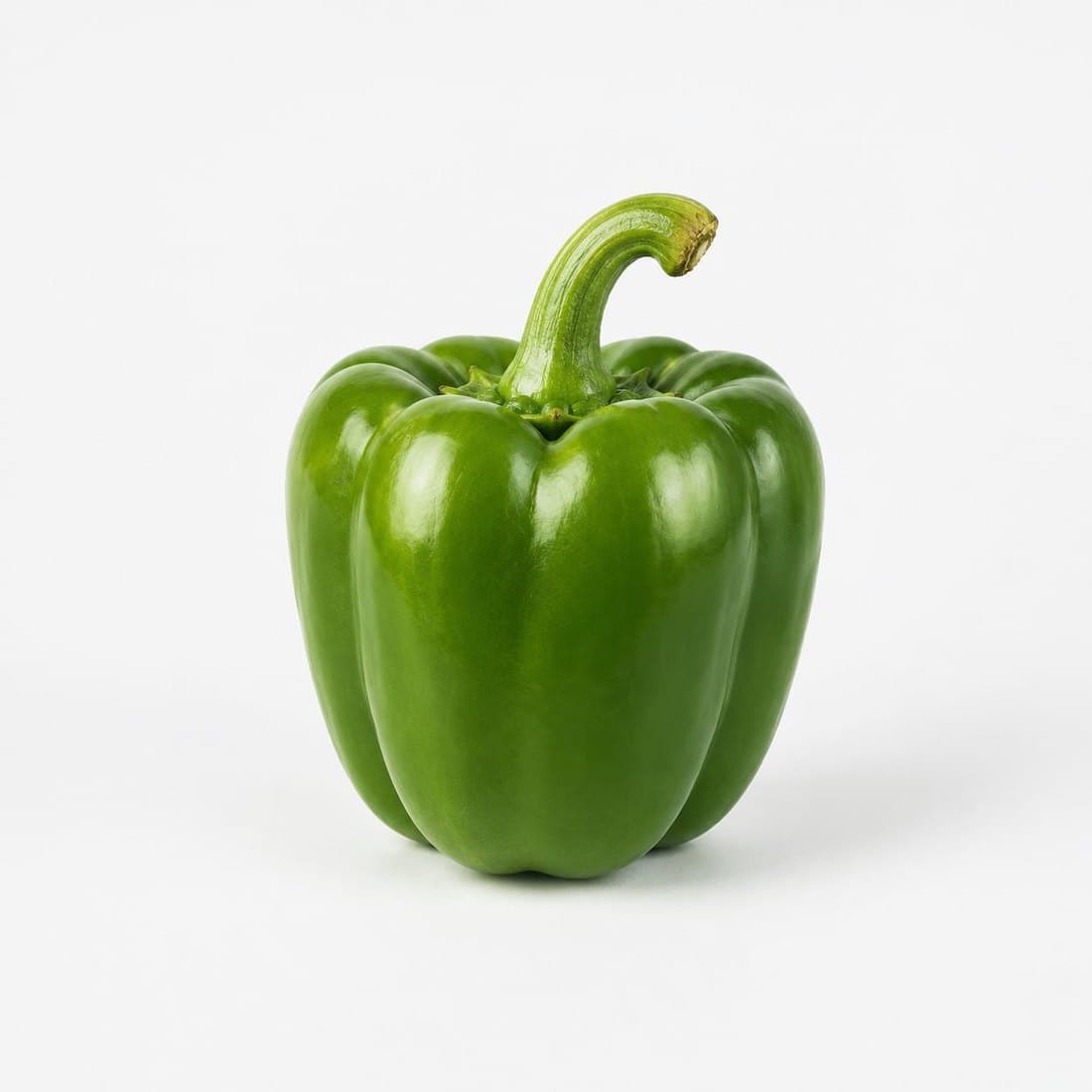 A whole green capsicum