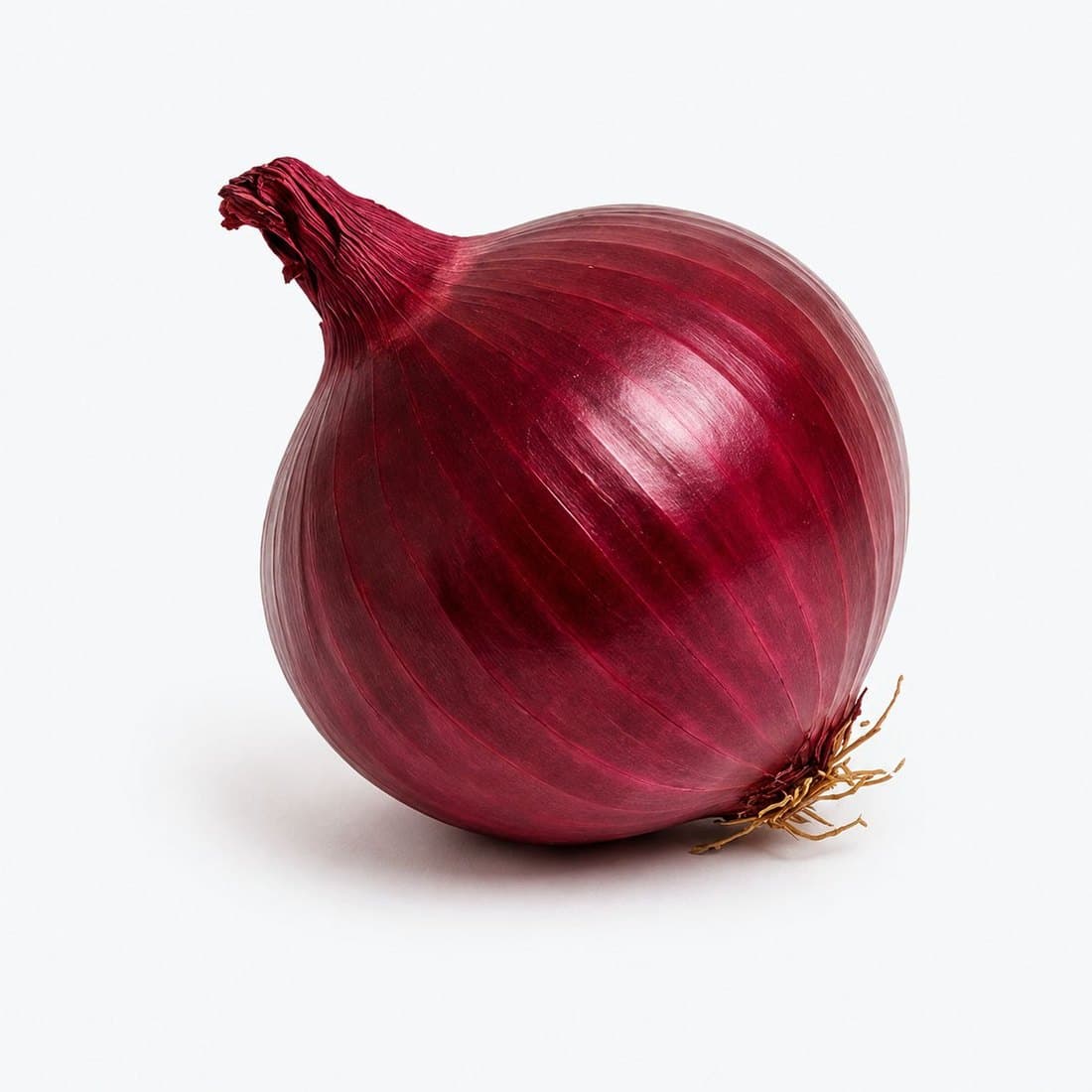 A whole red onion